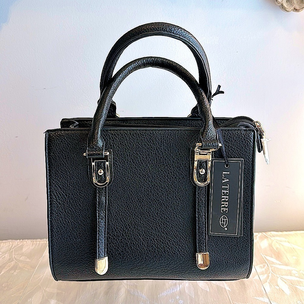 Adaptable black handbag. Perfect size with crossbody strap. New w/ tags